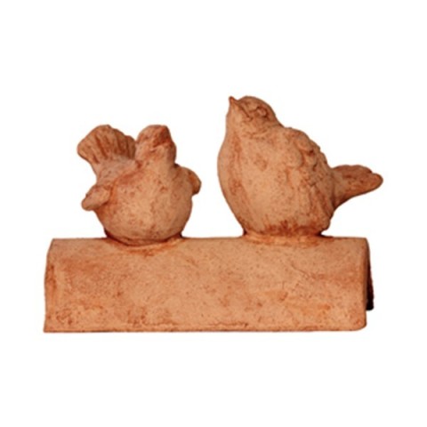 Uccellino sul coppo in terracotta
