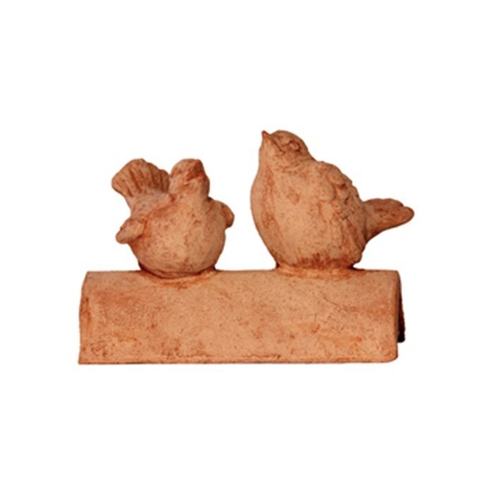 Uccellino sul coppo in terracotta