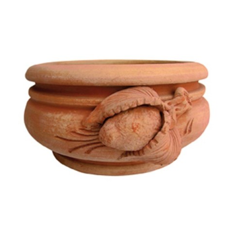Terracotta bowl with turned lemons